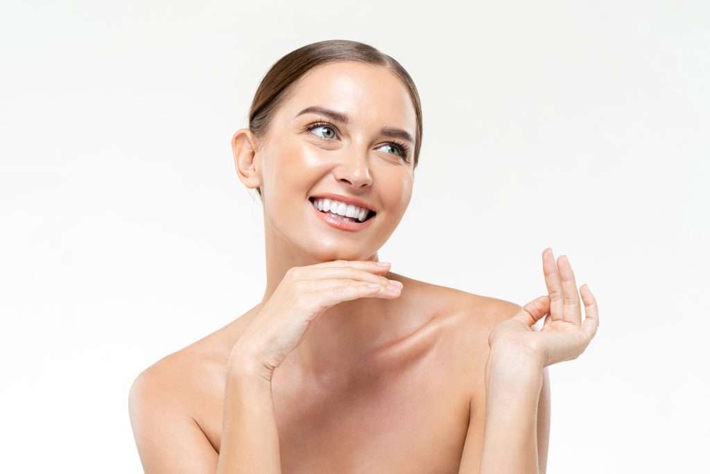 lady presenting glowing skin on her face